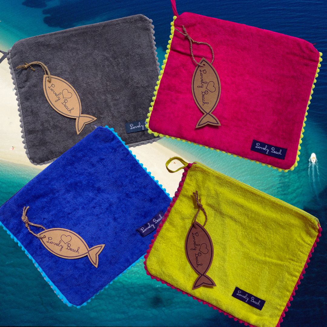 MARISOL toiletry bag with pompoms