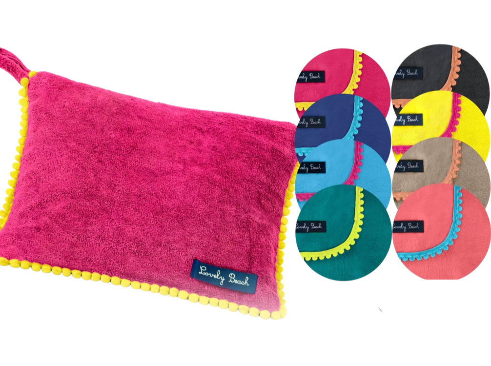 MARISOL toiletry bag with pompoms